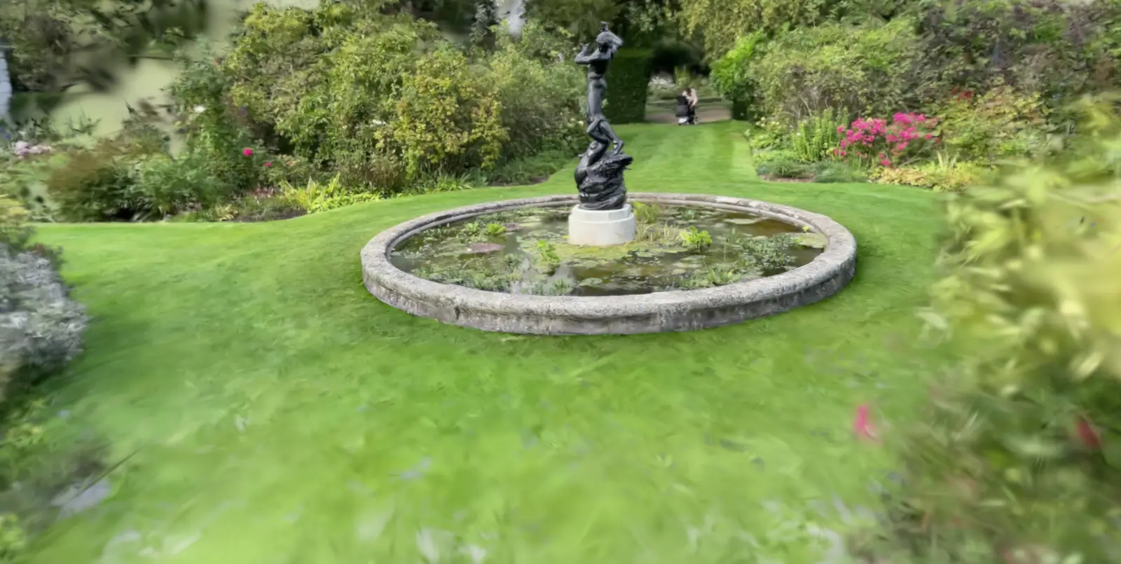 3D-captured garden with a round fountain